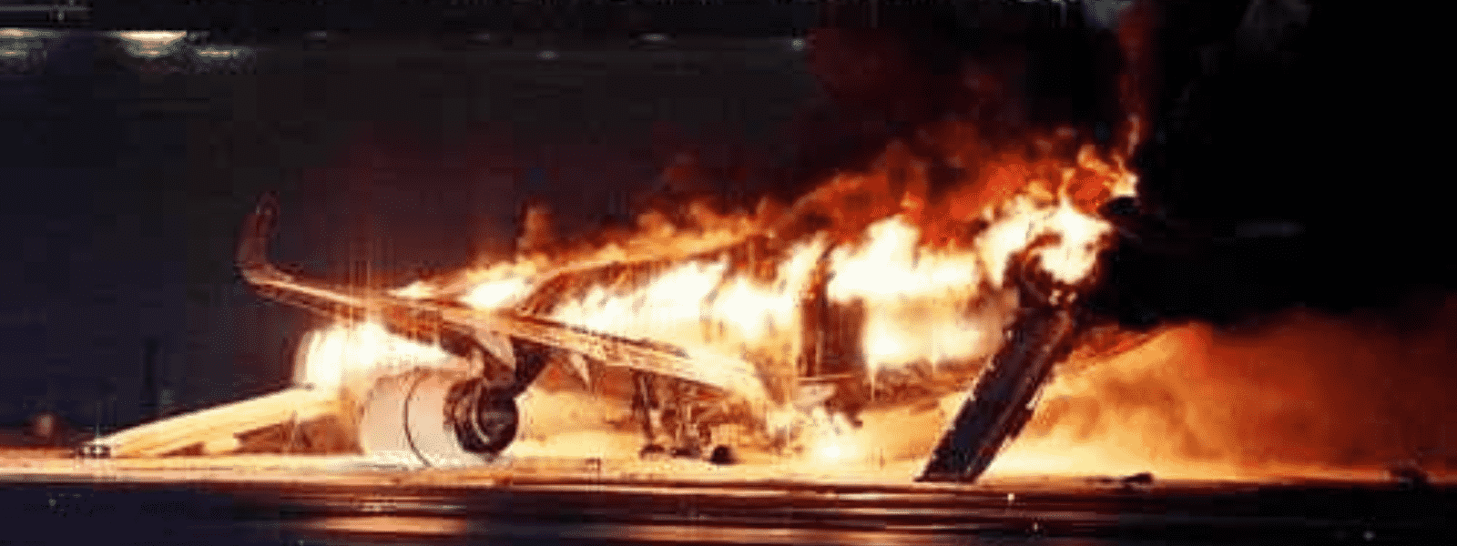 Plane Catches Fire At Tokyo's Haneda Airport